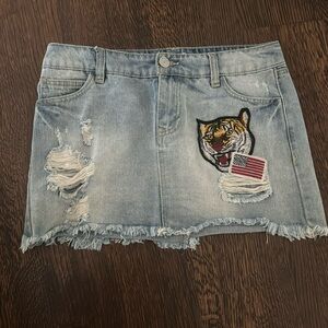 Charlotte Russe Refuge tiger, patch denim skirt
